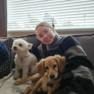 Holly and Coco with their owner in Char's review.